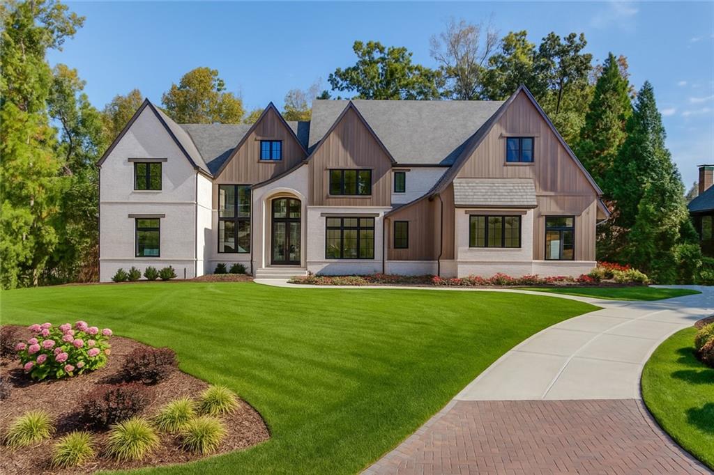 4635 Whitestone Way Suwanee, GA 30024 - Photo 3 of 27 a view of a house with a yard