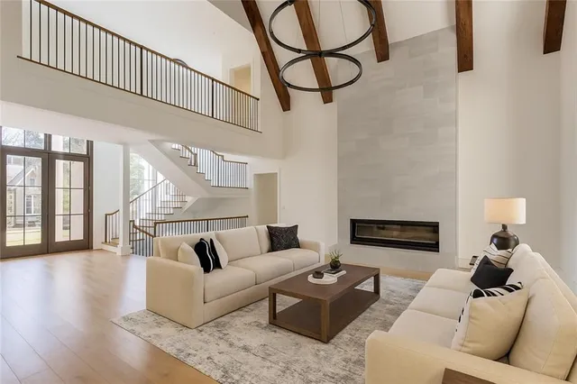 a living room with furniture or couch and a wooden floor