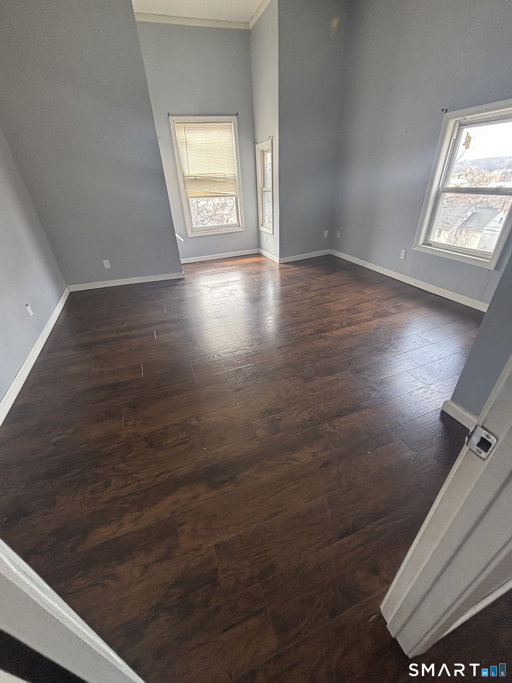 75 High Street, Unit 3E Waterbury, CT 06704 - Photo 6 of 6 a view of an empty room and window