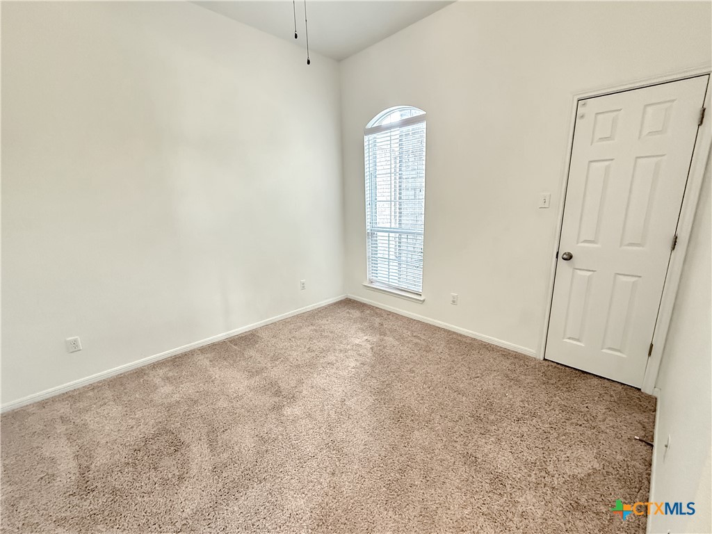 305 Brunswick Temple, TX 76502 - Photo 15 of 28 an empty room with windows