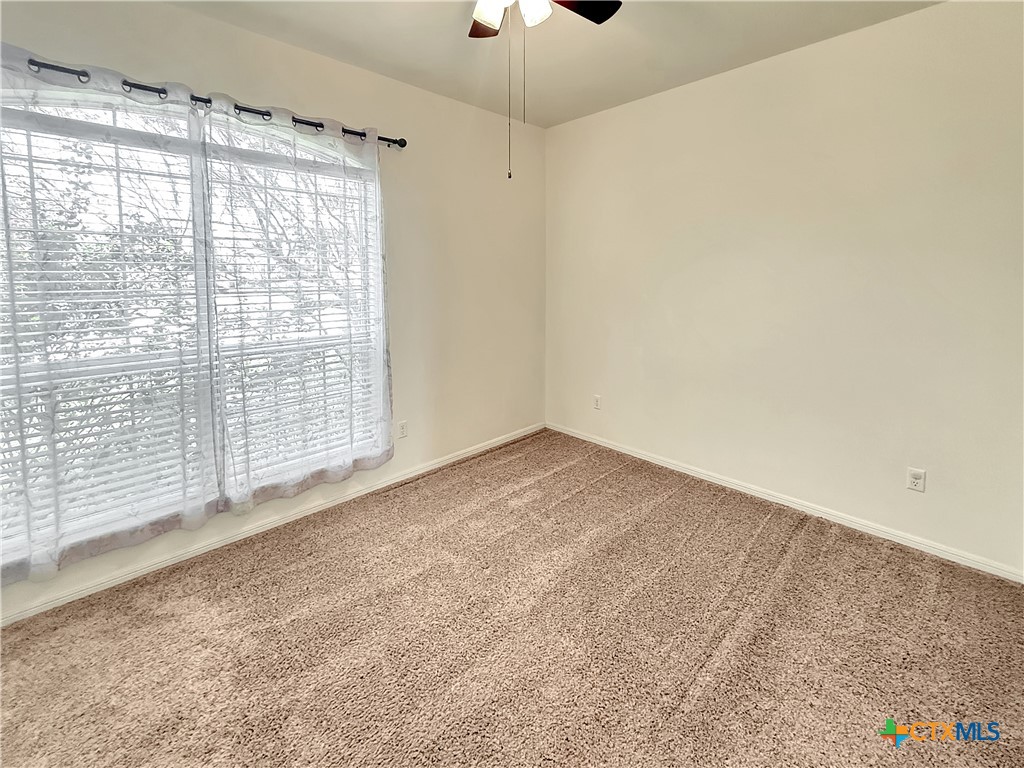 305 Brunswick Temple, TX 76502 - Photo 19 of 28 a view of an empty room with a window