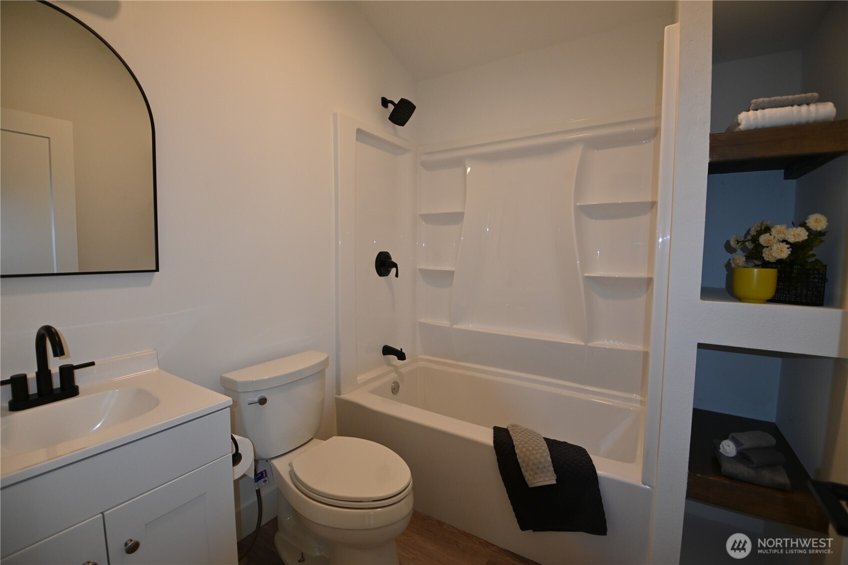 36010 State Route 2, Unit 2 Sultan, WA 98294 - Photo 13 of 28 a bathroom with a sink a toilet and shower