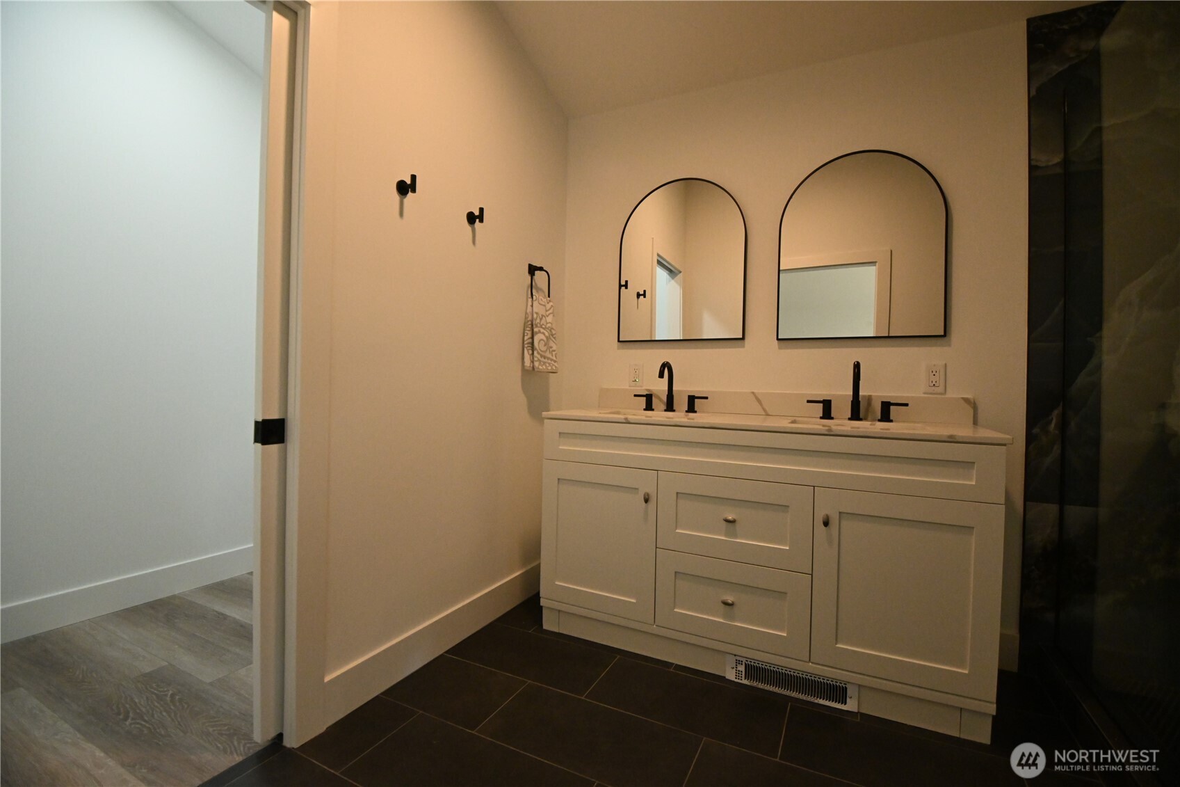 36010 State Route 2, Unit 2 Sultan, WA 98294 - Photo 19 of 28 a bathroom with a granite countertop sink a mirror and shower