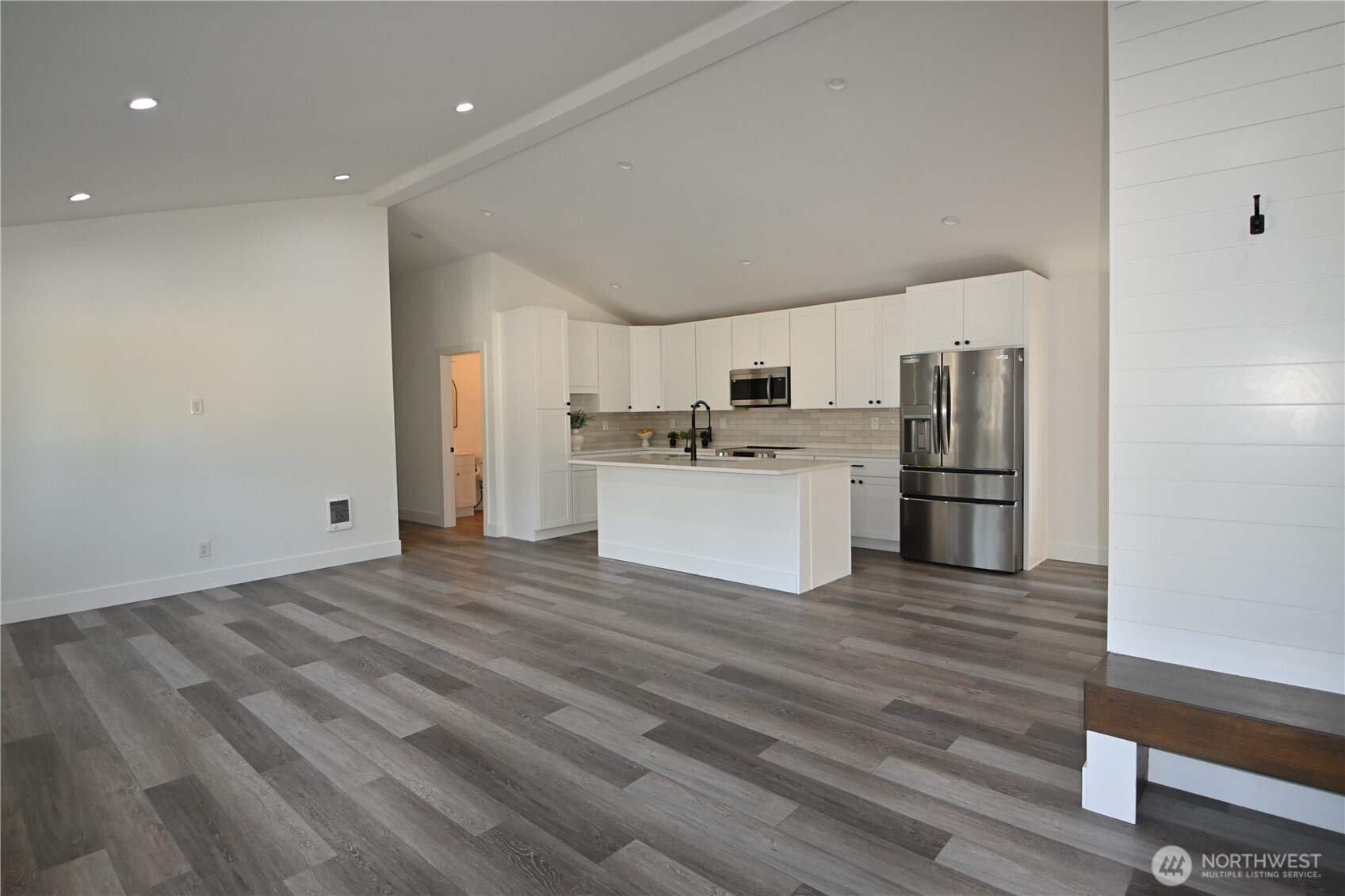 36010 State Route 2, Unit 2 Sultan, WA 98294 - Photo 25 of 28 a view of a kitchen with a sink a refrigerator and a stove top oven
