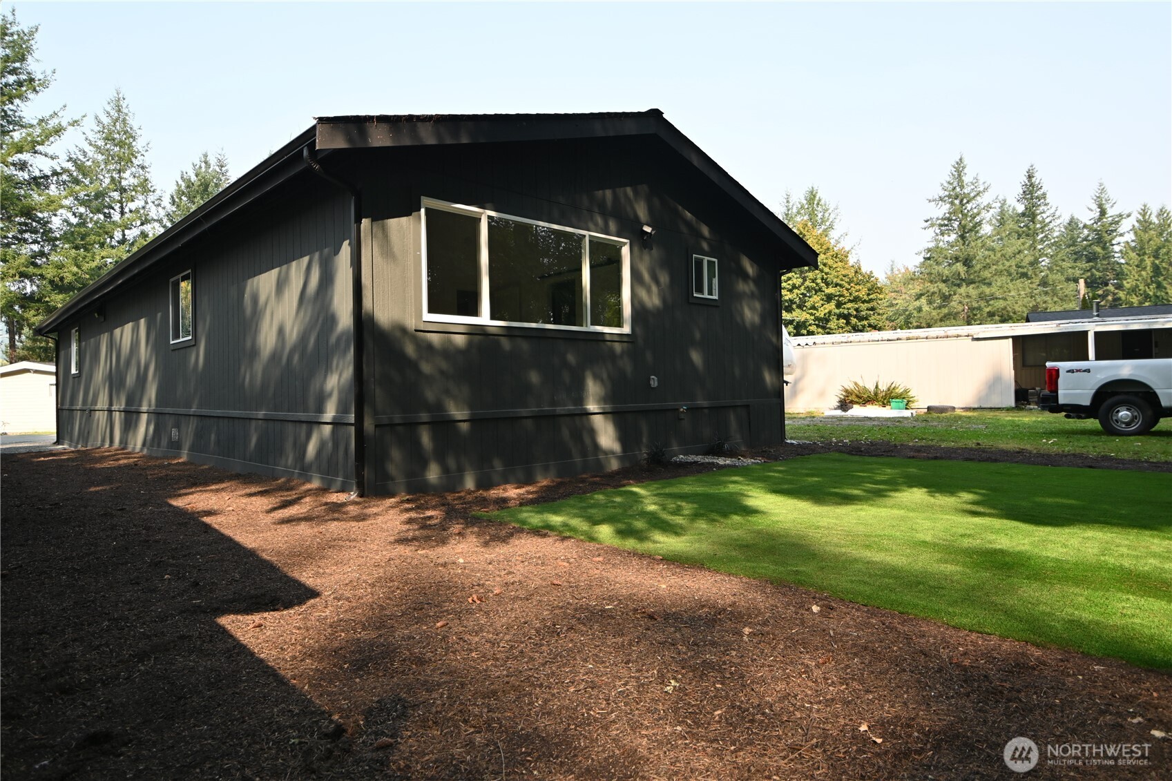 36010 State Route 2, Unit 2 Sultan, WA 98294 - Photo 28 of 28 a backyard of a house with lots of green space