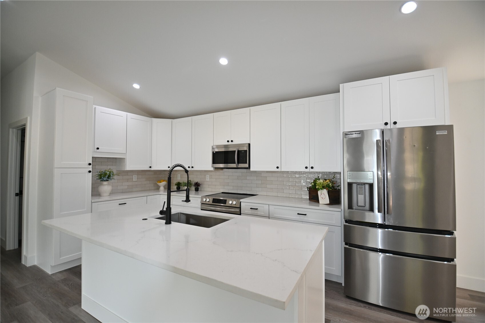36010 State Route 2, Unit 2 Sultan, WA 98294 - Photo 8 of 28 a kitchen with stainless steel appliances a refrigerator sink and microwave