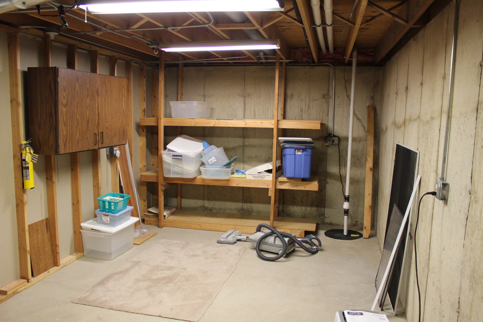 737 Alice Place Elgin, IL 60123 - Photo 24 of 28 a room with wooden furniture