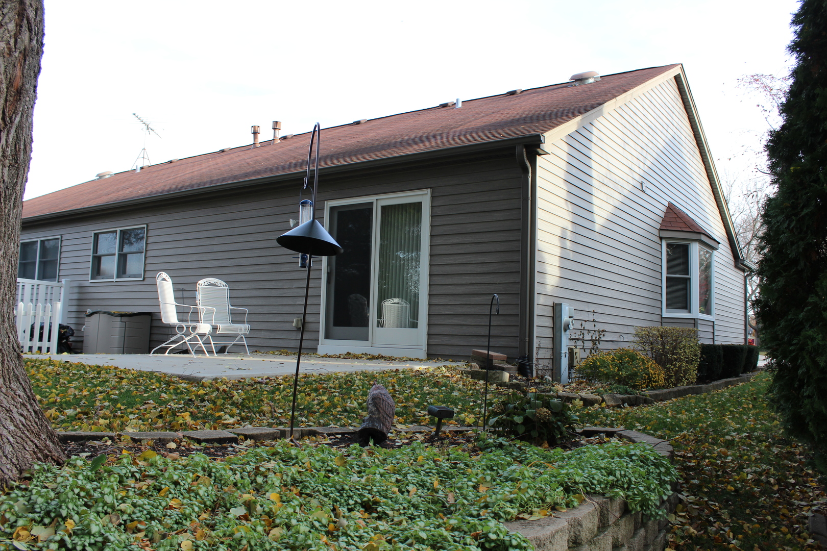 737 Alice Place Elgin, IL 60123 - Photo 28 of 28 a front view of a house with garden