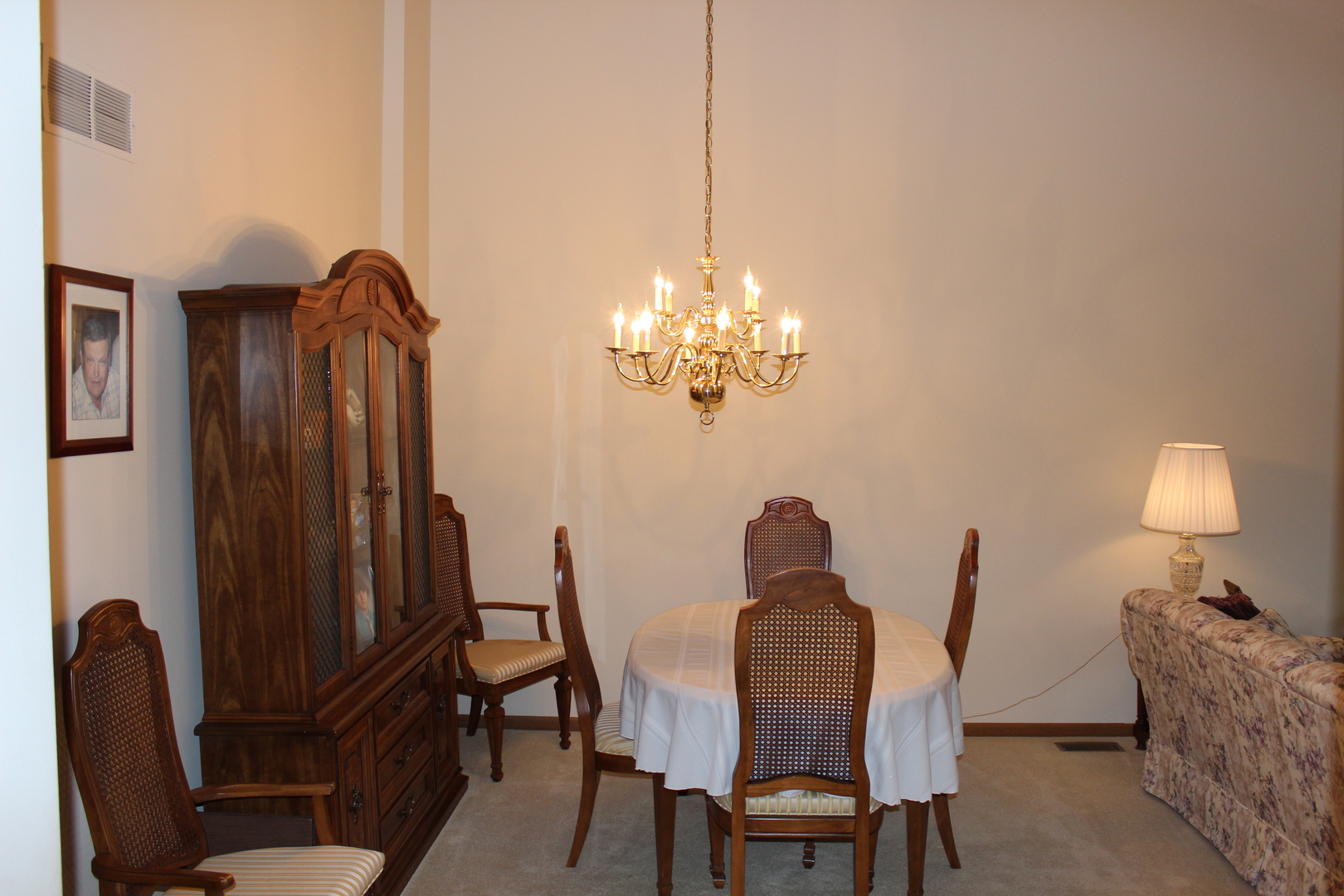 737 Alice Place Elgin, IL 60123 - Photo 5 of 28 a view of a dining room with furniture and chandelier