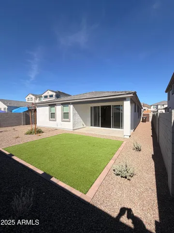 a house view with a garden space
