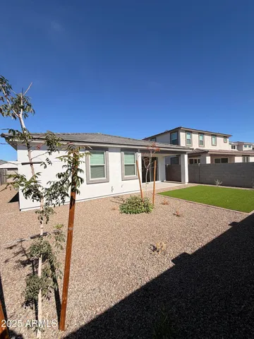 a house view with a backyard space