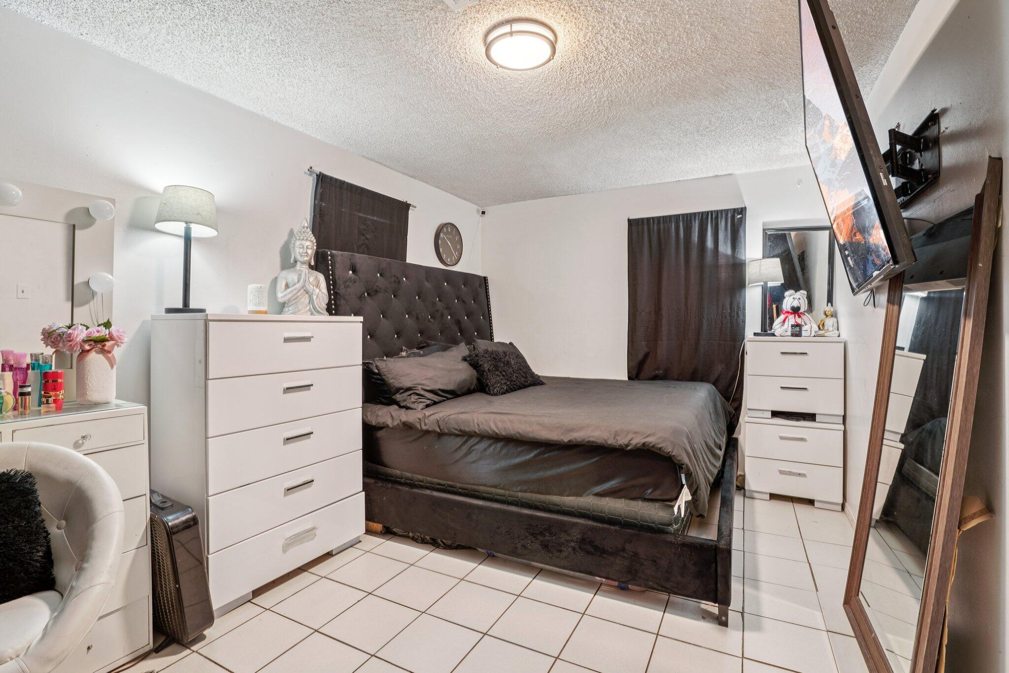 2154 Riviera Circle Thermal, CA 92274 - Photo 20 of 43 a bedroom with a bed and furniture