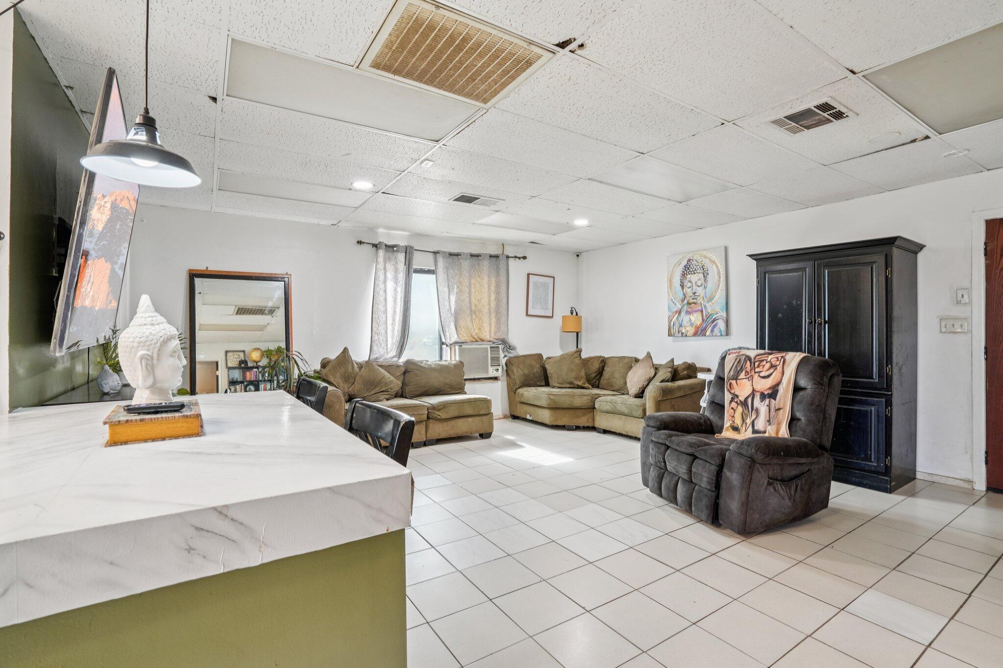 2154 Riviera Circle Thermal, CA 92274 - Photo 8 of 43 a living room with furniture