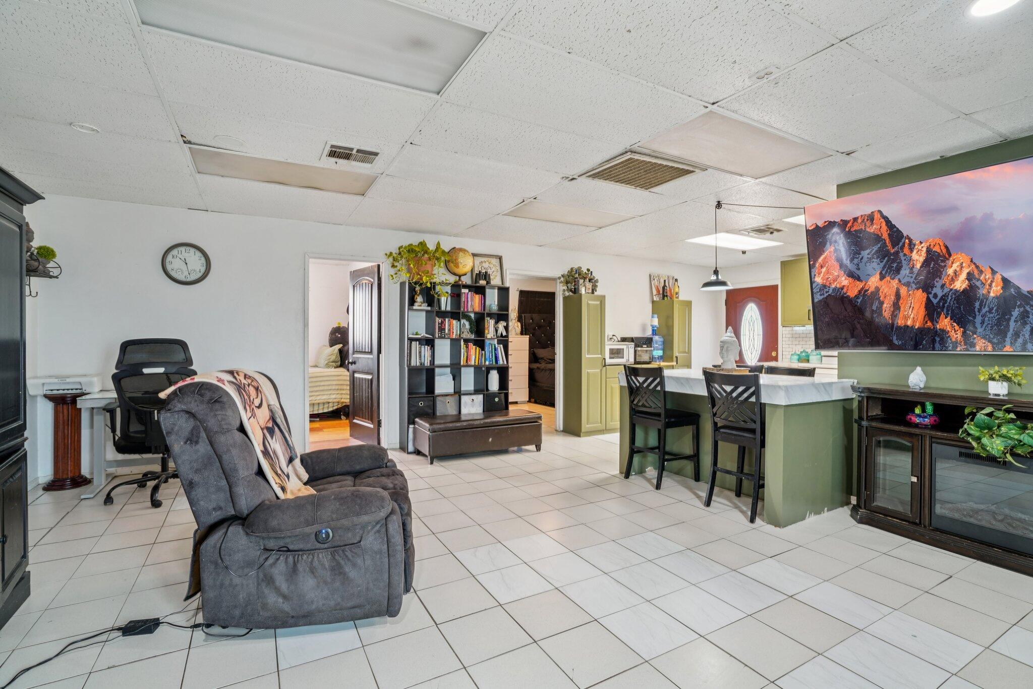2154 Riviera Circle Thermal, CA 92274 - Photo 10 of 43 a living room with furniture and a flat screen tv