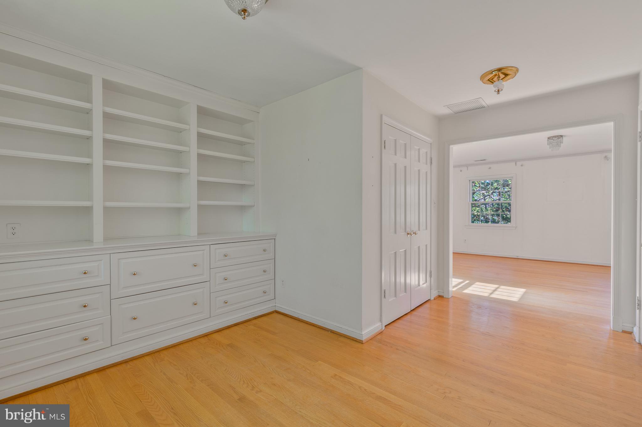 6315 Stoneham Lane McLean, VA 22101 - Photo 15 of 18 a view of an empty room with cabinet
