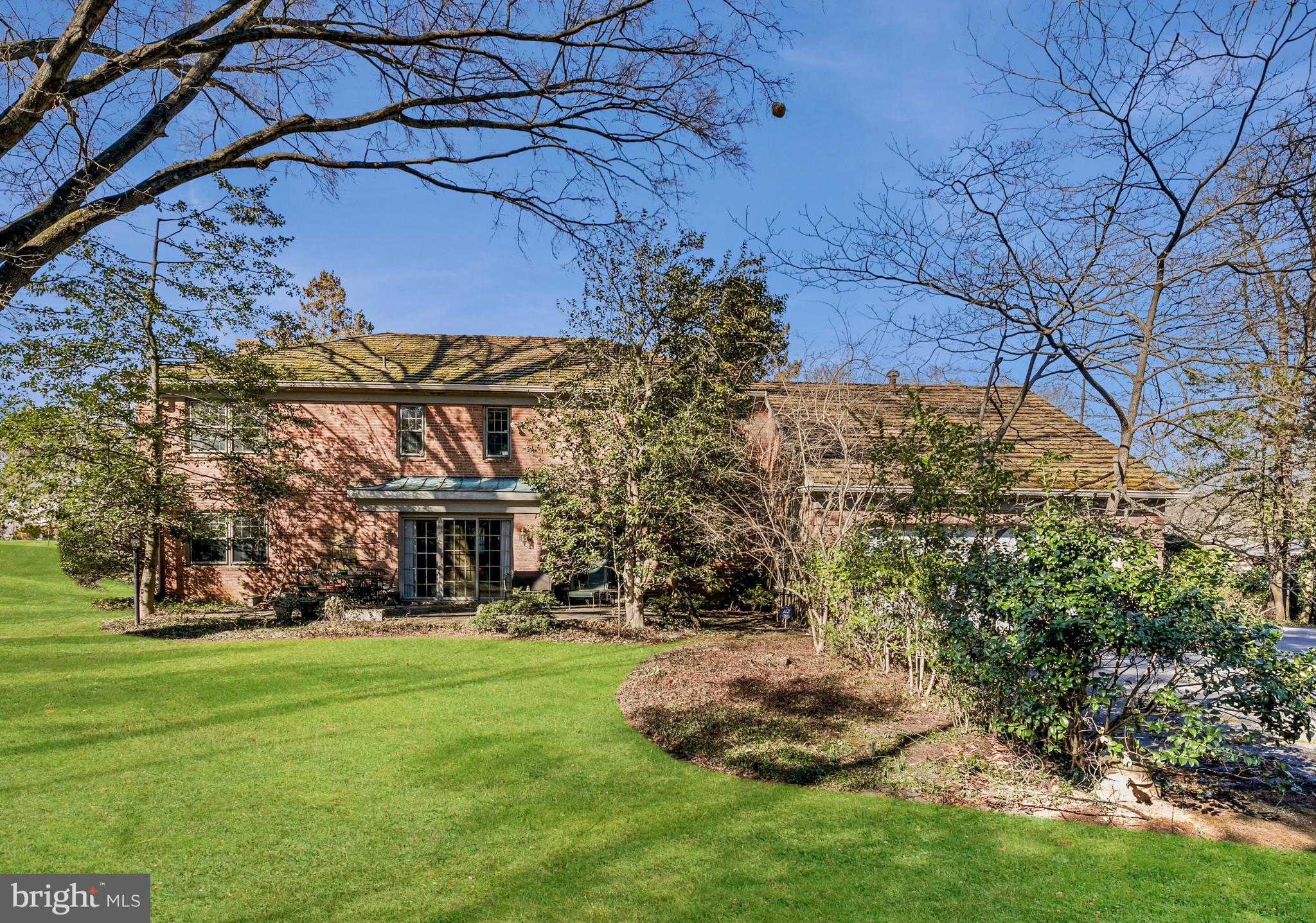 6315 Stoneham Lane McLean, VA 22101 - Photo 18 of 18 a view of a house with a yard