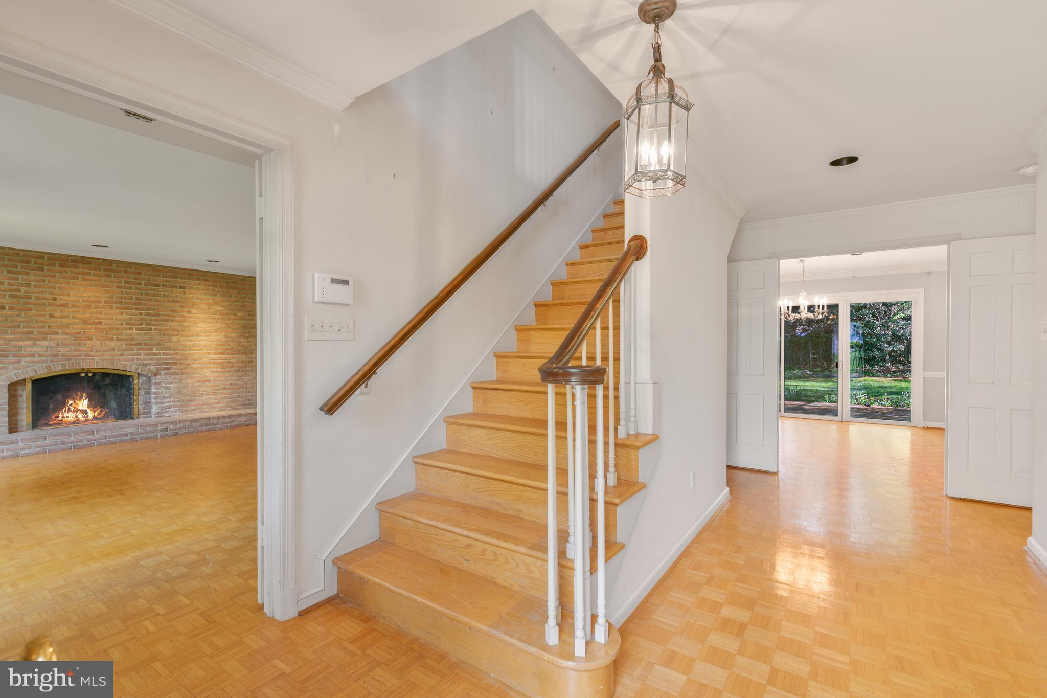 6315 Stoneham Lane McLean, VA 22101 - Photo 4 of 18 a view of entryway and hall with wooden floor