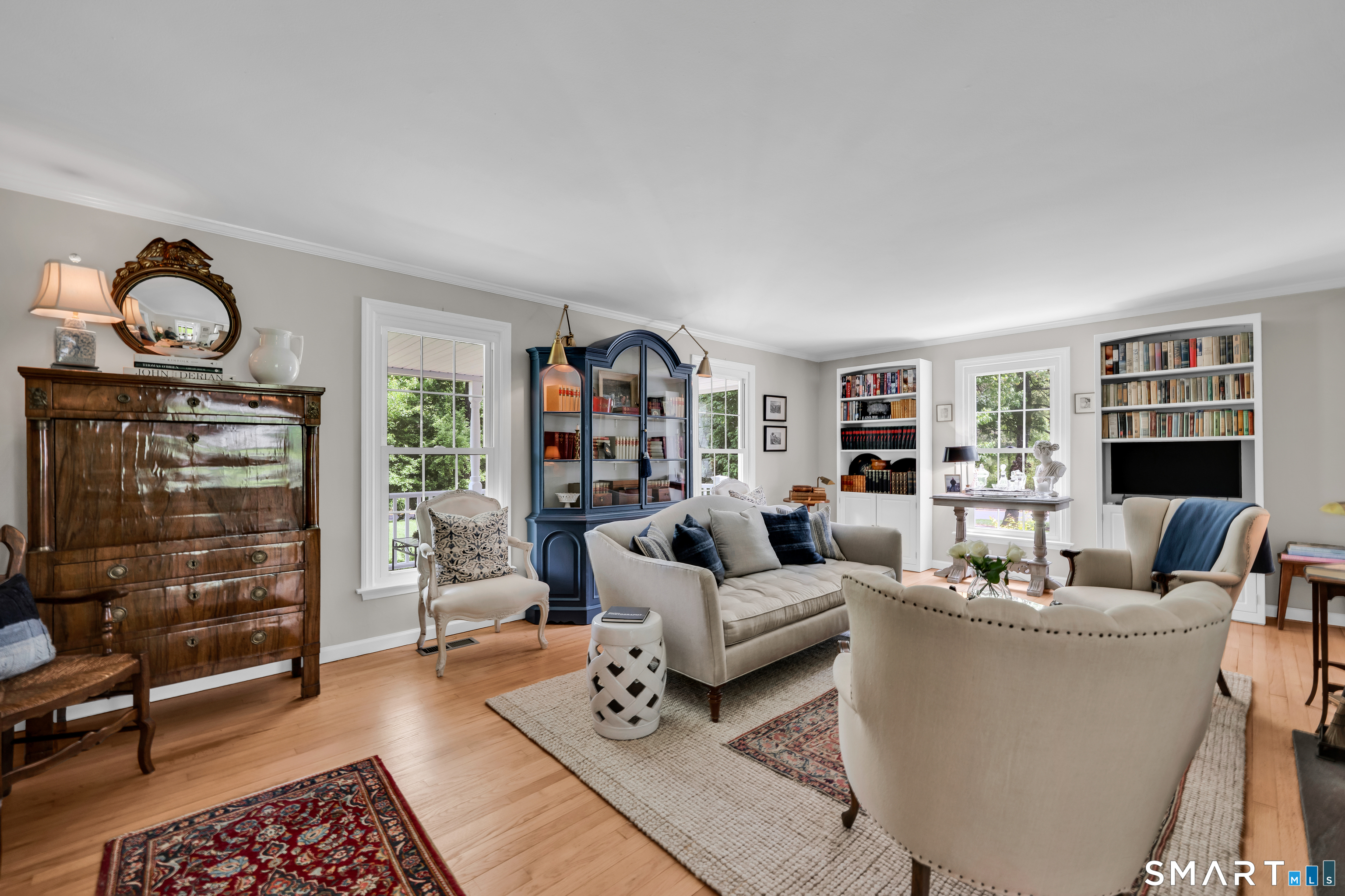 1000 Bassett Road Watertown, CT 06795 - Photo 6 of 35 a living room with furniture a rug and a window