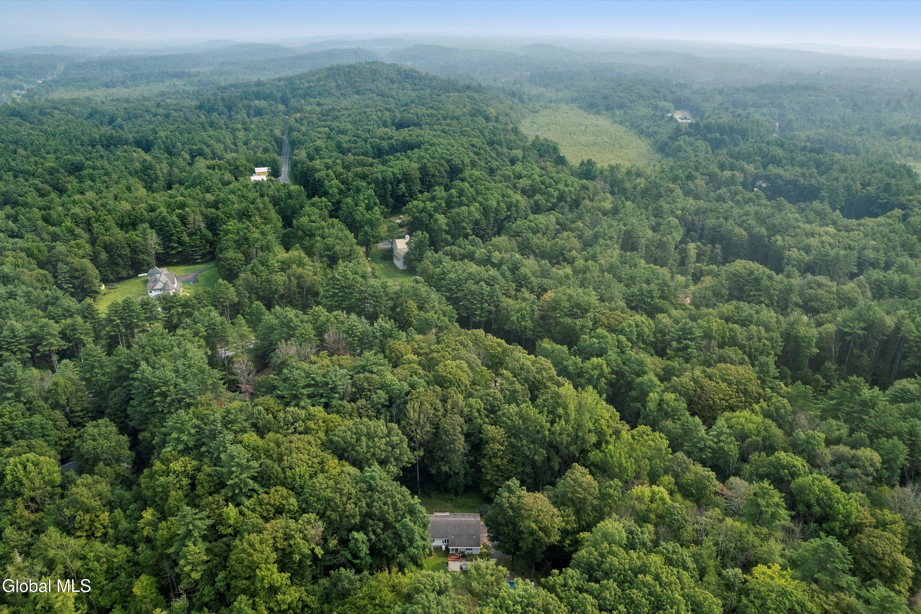825 Stone Church Road Greenfield, NY 12850 - Photo 2 of 36 02-dji_fly_20250804_095420_197_175434100