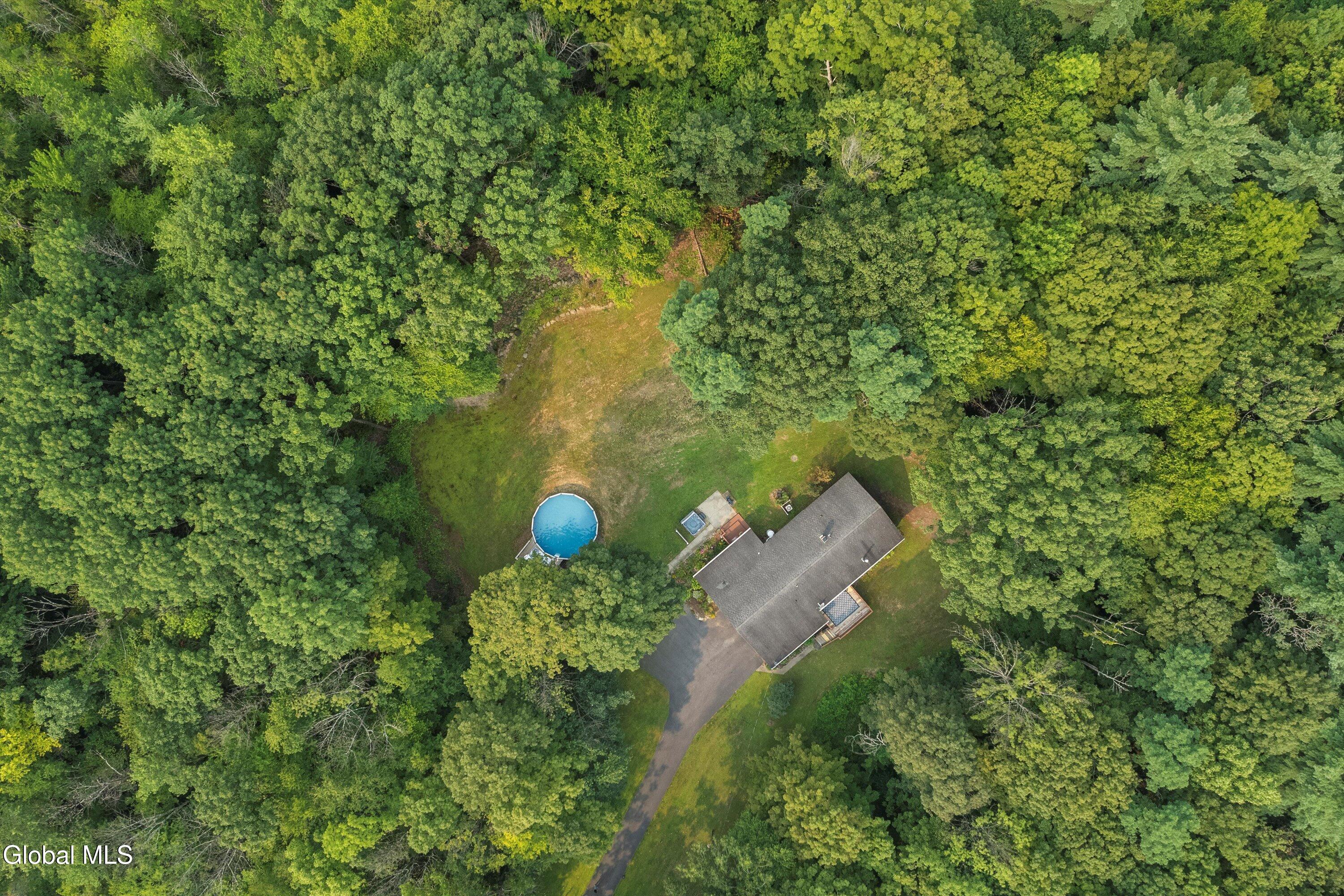 825 Stone Church Road Greenfield, NY 12850 - Photo 3 of 36 03-dji_fly_20250804_094552_158_175434075