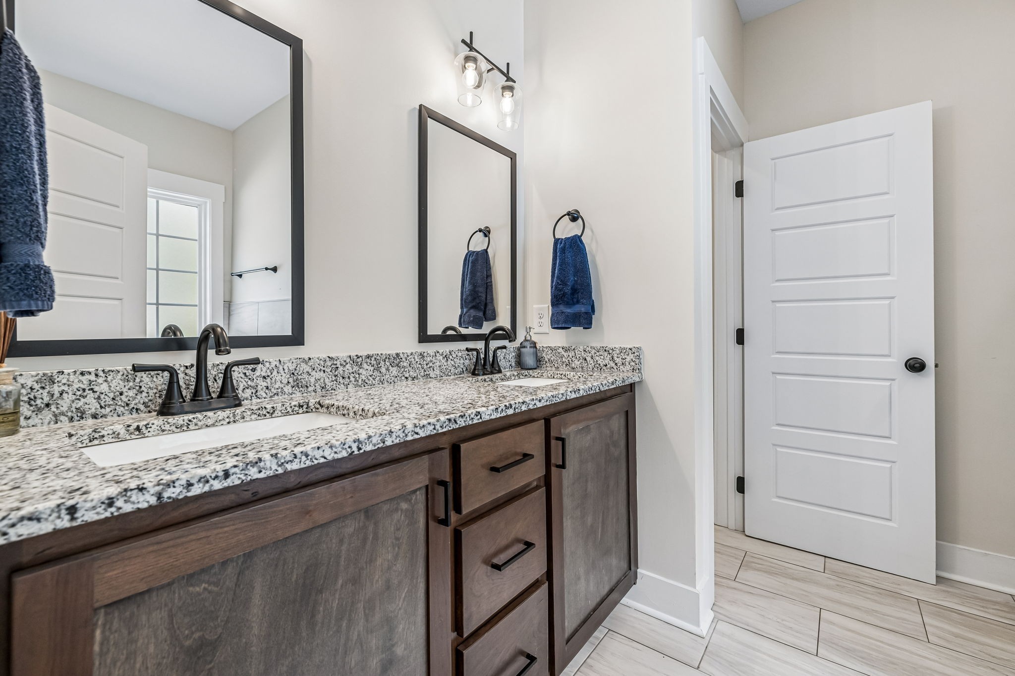 1845 Dinsmore Road Clarksville, TN 37040 - Photo 15 of 36 a bathroom with a granite countertop sink and a mirror