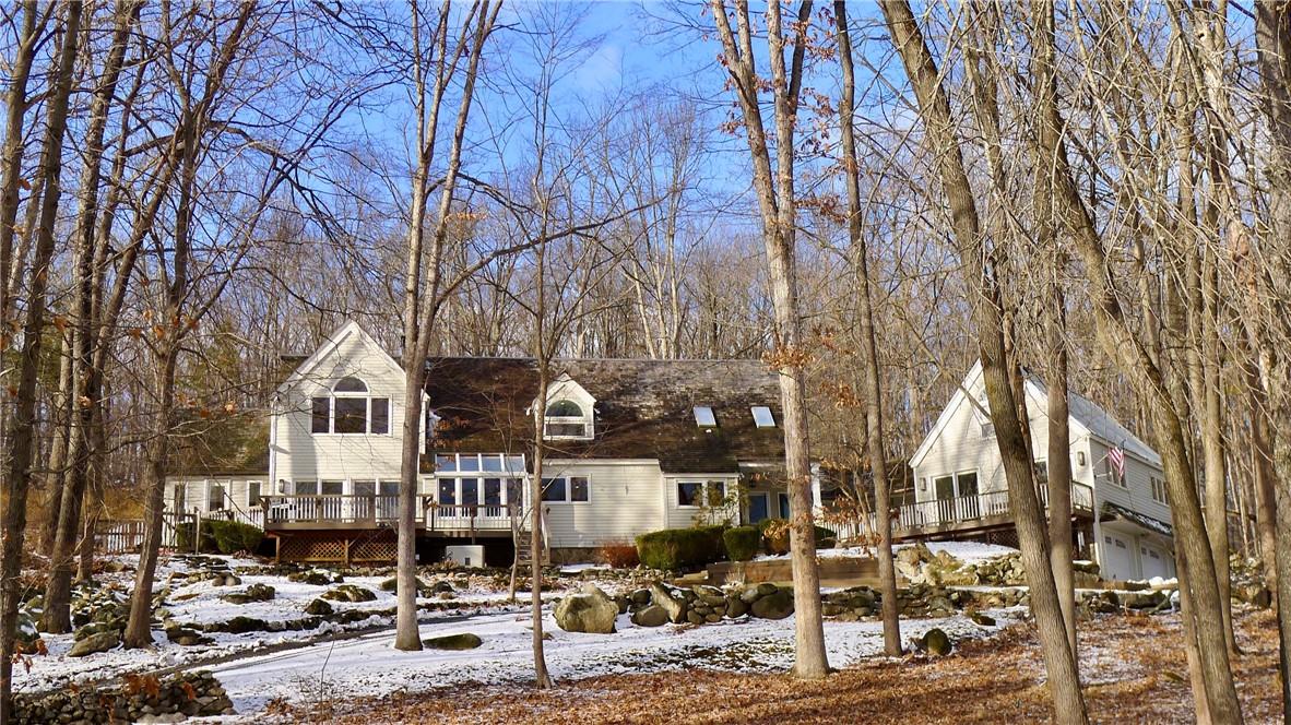 26 Newport Bridge Road Warwick, NY 10990 - Photo 1 of 1 Private and peaceful surroundings with fenced areas for pets and gardens. Set on 14+ acres with office or studio space with private entrance, inground pool with pool house ~ a perfect retreat for weekends or full time. Welcome home to 26 Newport Bridge Road, Warwick, NY
