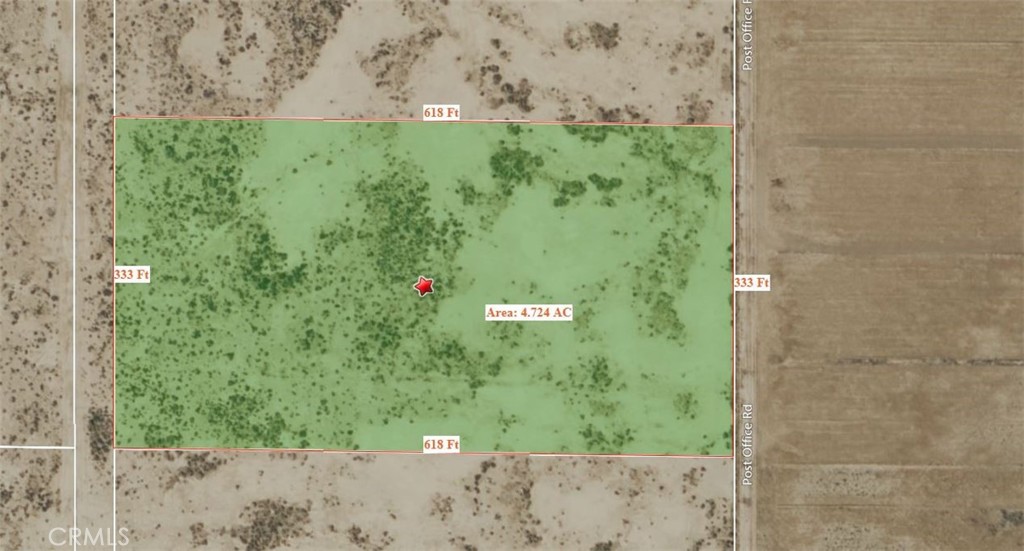 a view of a wall with a tree in the background