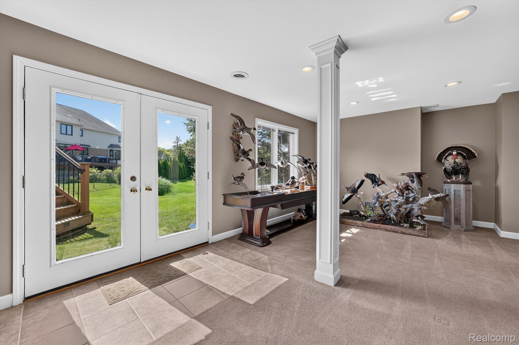 3804 Elk Drive Rochester, MI 48306 - Photo 52 of 75 French doors leading from the walkout level to the backyard.