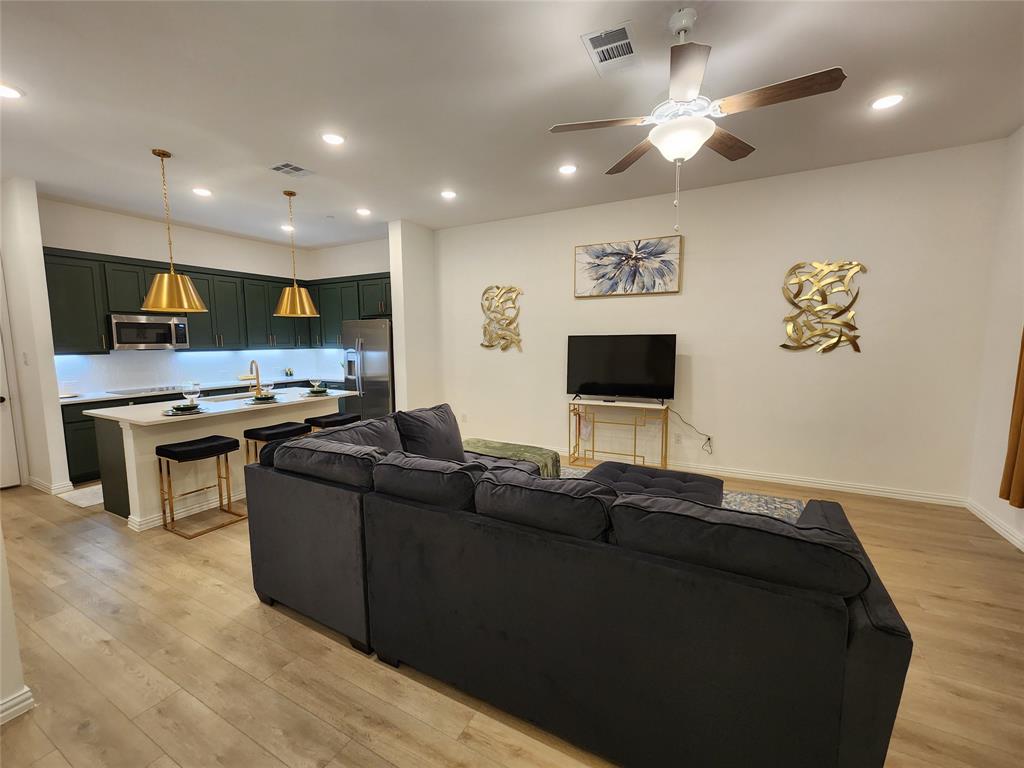 632 Blue Rdg Drive Mansfield, TX 76063 - Photo 5 of 16 Living area featuring light wood-style flooring, recessed lighting, and ceiling fan