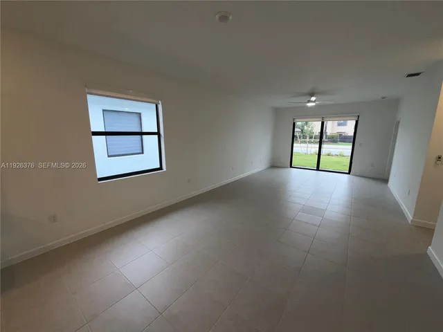 an empty room with windows