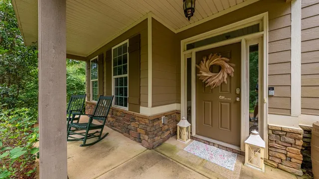 a front view of a house with a porch