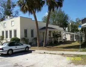 a car parked in front of a house