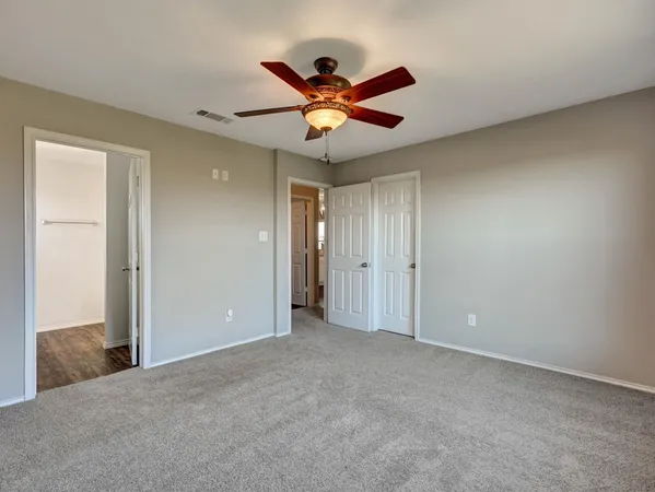 a view of a livingroom with a ceiling fan