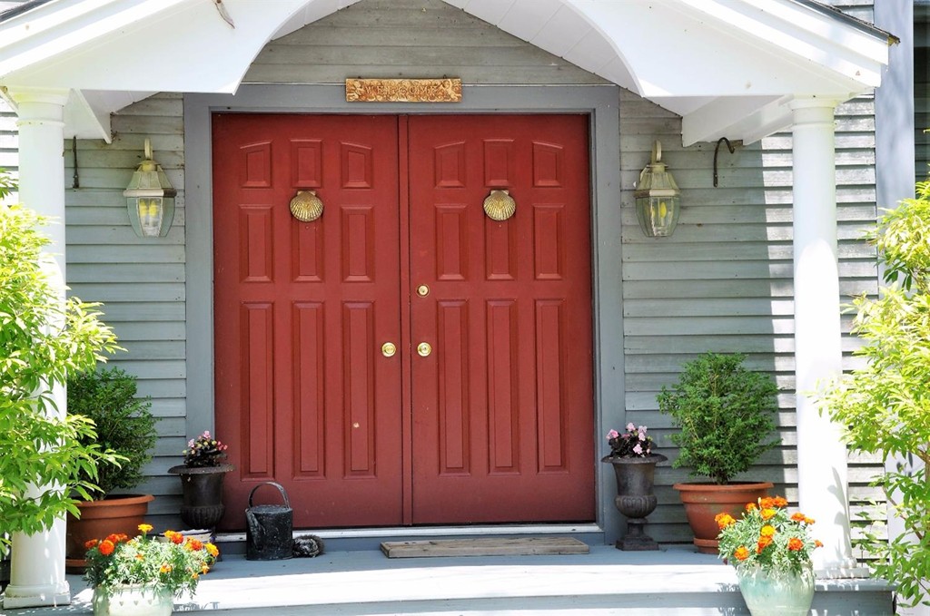 16 Baker Road Wellfleet, MA 02667 - Photo 1 of 25 a front view of a house with a yard