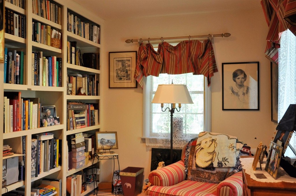 16 Baker Road Wellfleet, MA 02667 - Photo 11 of 25 a living room with furniture and a book shelf