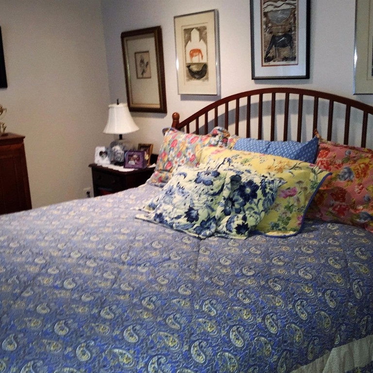 16 Baker Road Wellfleet, MA 02667 - Photo 13 of 25 a bed sitting in a bedroom next to a window