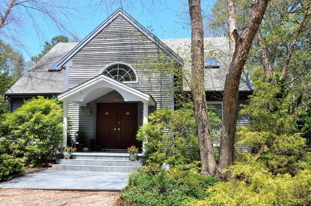 16 Baker Road Wellfleet, MA 02667 - Photo 2 of 25 a front view of a house with garden