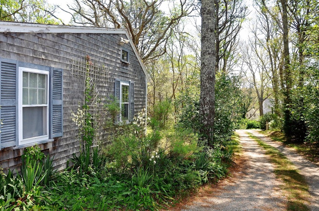 16 Baker Road Wellfleet, MA 02667 - Photo 21 of 25 a view of a pathway both side of house