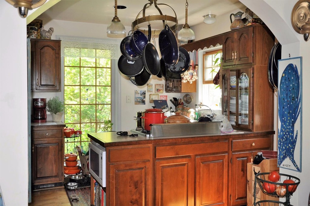16 Baker Road Wellfleet, MA 02667 - Photo 10 of 25 a kitchen with stainless steel appliances granite countertop a sink and cabinets
