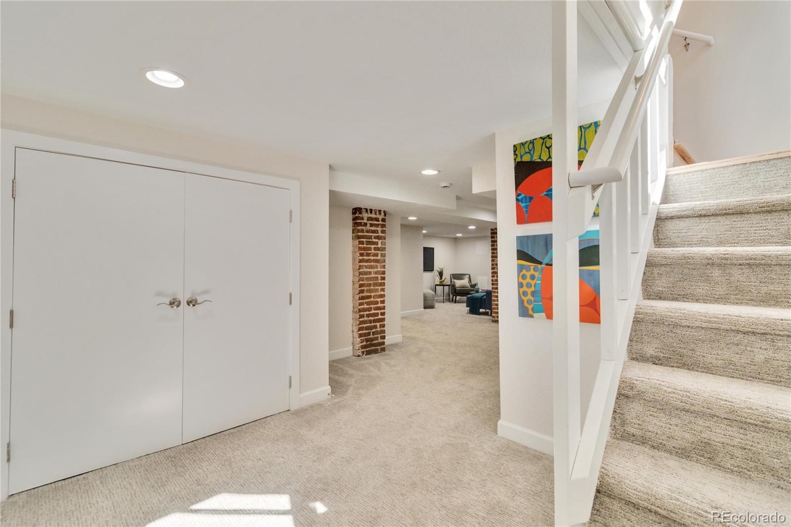 1325 Dahlia Street Denver, CO 80220 - Photo 28 of 44 a view of staircase with white walls and white walls
