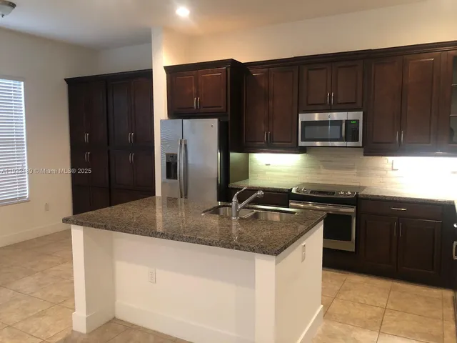 a view of a hallway with staircase