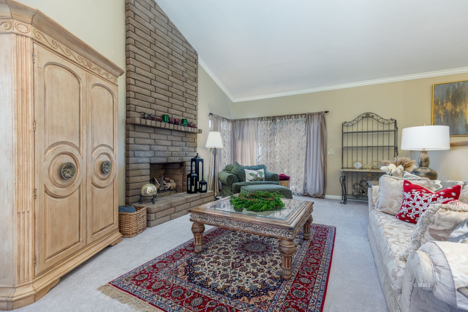 815 Hurschell Avenue Ridgecrest, CA 93555 - Photo 5 of 43 a living room with furniture and a fireplace