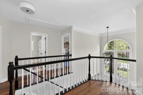 a view of entryway with wooden floor