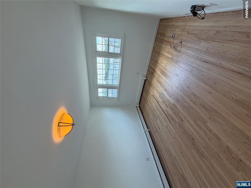 53 Devon Terrace, Unit 2 Kearny, NJ 07032 - Photo 12 of 15 an empty room with a window