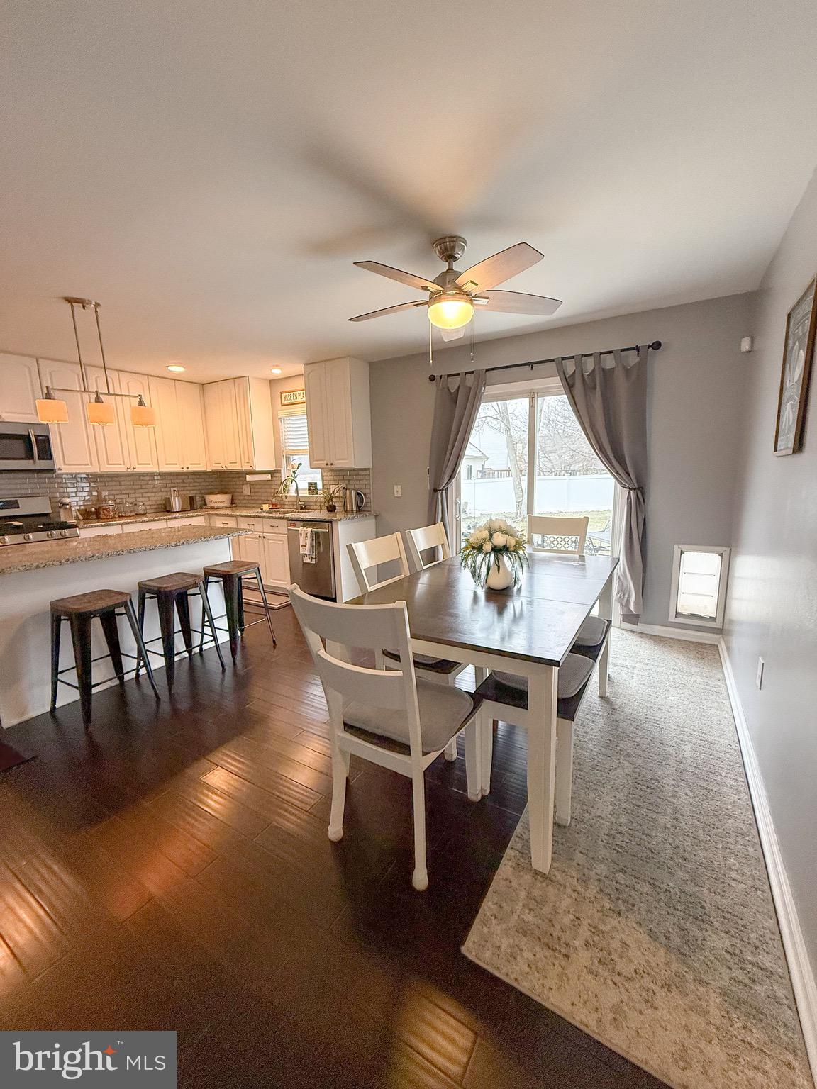 121 Chestnut Drive Elkton, MD 21921 - Photo 6 of 20 a view of a dining room with furniture window and wooden floor
