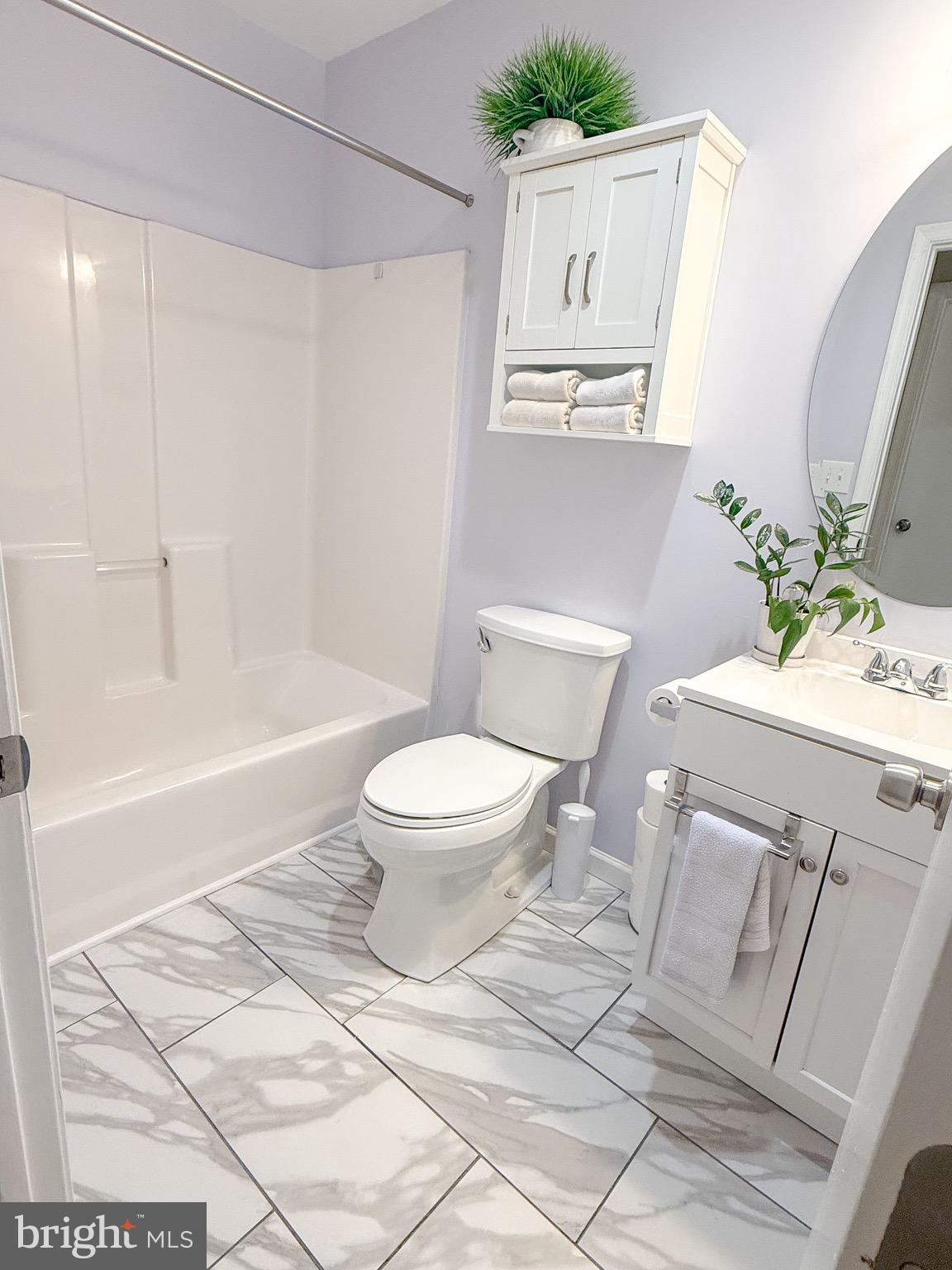 121 Chestnut Drive Elkton, MD 21921 - Photo 9 of 20 a bathroom with a sink toilet and shower