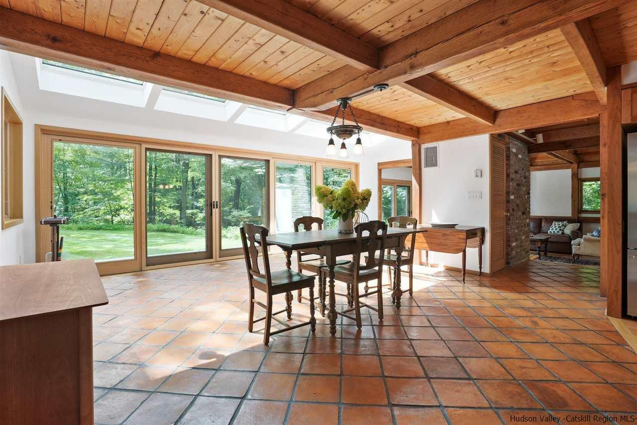 48 Rock Ridge Road New Paltz, NY 12561 - Photo 11 of 35 a view of a dining room with furniture window and outside view