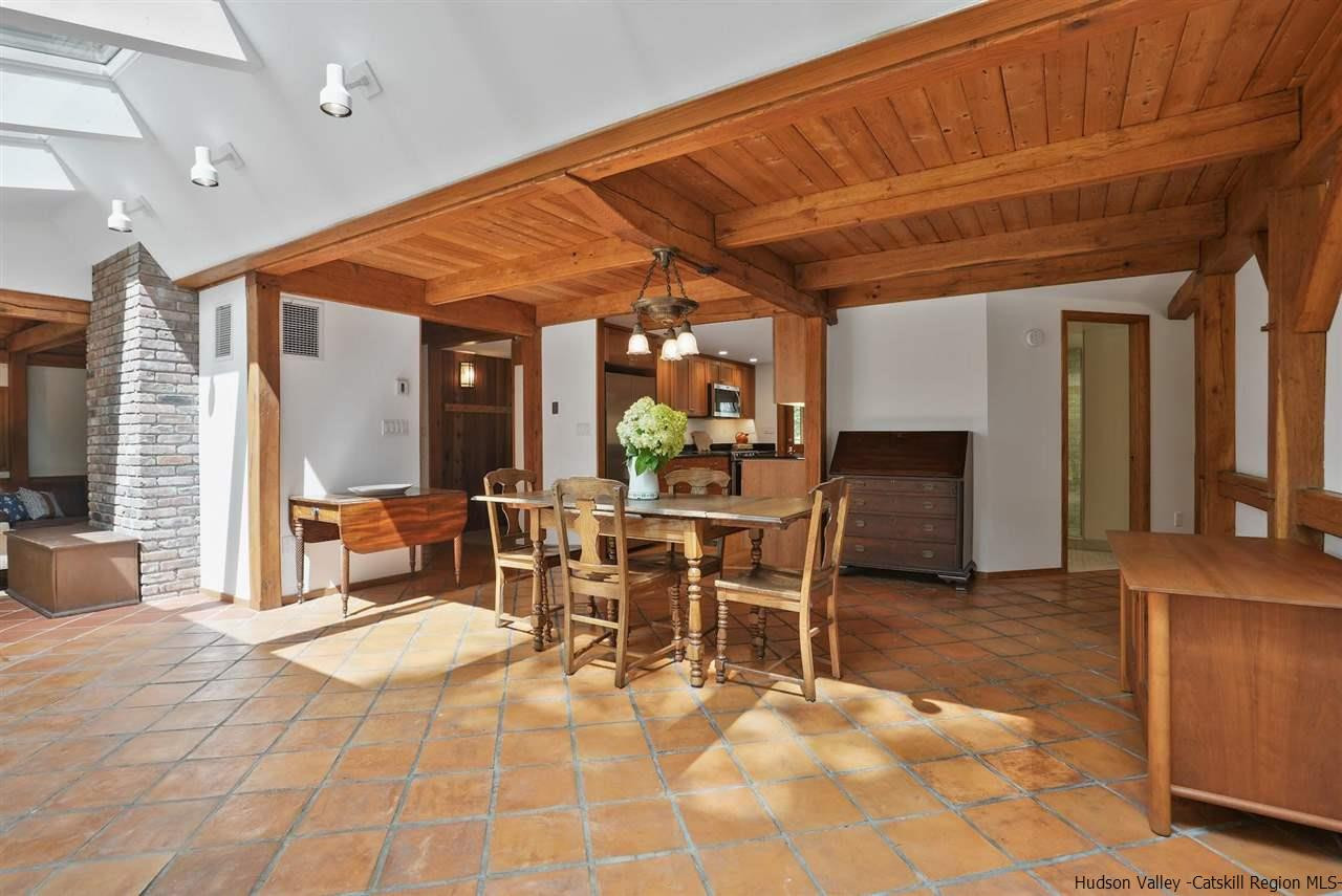 48 Rock Ridge Road New Paltz, NY 12561 - Photo 12 of 35 a view of a dining room with furniture window and outside view