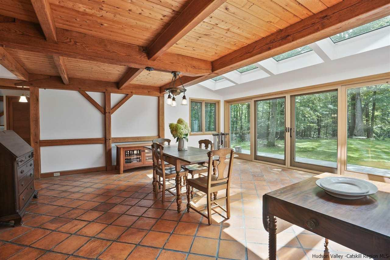 48 Rock Ridge Road New Paltz, NY 12561 - Photo 13 of 35 a dining room with furniture and large windows