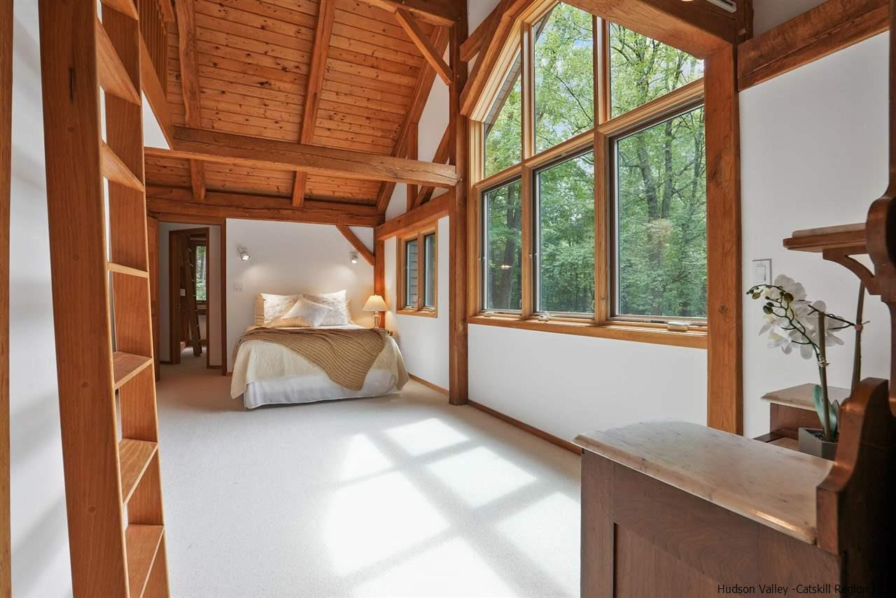 48 Rock Ridge Road New Paltz, NY 12561 - Photo 21 of 35 a view of hotel room with a large window
